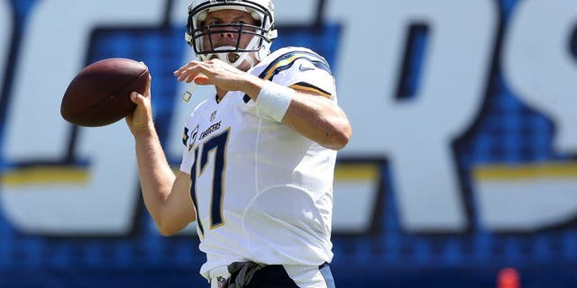SAN DIEGO, CA - SEPTEMBER 28: Philip Rivers #17 of the San Diego Chargers throws the ball during warmups for the game with the Jacksonville Jaguars at Qualcomm Stadium on September 28, 2014 in San Diego, California. (Photo by Stephen Dunn/Getty Images)