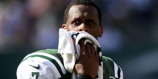 EAST RUTHERFORD, NJ - SEPTEMBER 28: Geno Smith #7 of the New York Jets looks on from the bench in the fourth quarter of their 24 to 17 loss to the Detroit Lions at MetLife Stadium on September 28, 2014 in East Rutherford, New Jersey. (Photo by Ron Antonelli/Getty Images)