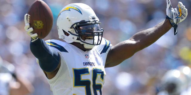 Sep 28, 2014; San Diego, CA, USA; San Diego Chargers inside linebacker Donald Butler (56) celebrates after recovering a fumble in the first half against the Jacksonville Jaguars at Qualcomm Stadium. Mandatory Credit: Robert Hanashiro-USA TODAY Sports