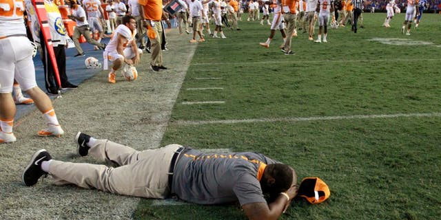 Sep 26, 2015; Gainesville, FL, USA; Tennessee Volunteers coach and players react as they lost to the Florida Gators at Ben Hill Griffin Stadium. Florida Gators defeated the Tennessee Volunteers 28-27. Mandatory Credit: Kim Klement-USA TODAY Sports