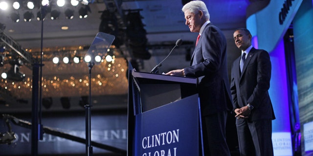 Sept. 25, 2012: Former President Bill Clinton introduces President Barack Obama at the Clinton Global Initiative Annual meeting in New York.