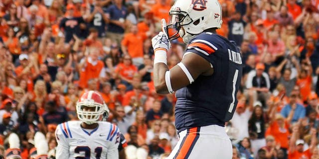 Sep 27, 2014; Auburn, AL, USA; Auburn Tigers wide receiver D'haquille Williams (1) celebrates a touchdown during the first half against the Louisiana Tech Bulldogs at Jordan Hare Stadium. Mandatory Credit: Shanna Lockwood-USA TODAY Sports