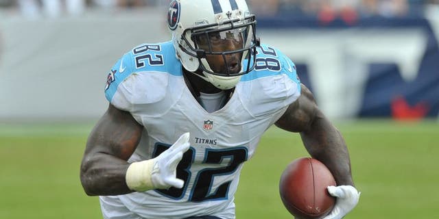 Sep 27, 2015; Nashville, TN, USA; Tennessee Titans tight end Delanie Walker (82) rushes against the Indianapolis Colts during the second half at Nissan Stadium. Indianapolis won 35-33. Mandatory Credit: Jim Brown-USA TODAY Sports