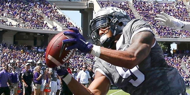 FORT WORTH, TX - SEPTEMBER 12: Josh Doctson #9 of the TCU Horned Frogs fails to hang onto a touch down pass under coverage from Demundre Freeman #26 of the Stephen F. Austin Lumberjacks in the first half at Amon G. Carter Stadium on September 12, 2015 in Fort Worth, Texas. (Photo by Tom Pennington/Getty Images)