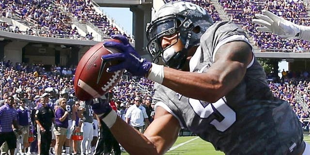 FORT WORTH, TX - SEPTEMBER 12: Josh Doctson #9 of the TCU Horned Frogs fails to hang onto a touch down pass under coverage from Demundre Freeman #26 of the Stephen F. Austin Lumberjacks in the first half at Amon G. Carter Stadium on September 12, 2015 in Fort Worth, Texas. (Photo by Tom Pennington/Getty Images)
