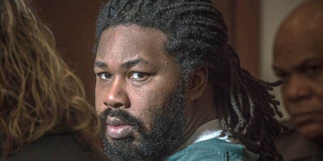 Nov. 14, 2014 photo shows Jesse Matthew Jr., right, looking toward the gallery in Fairfax, Va., courtroom.
