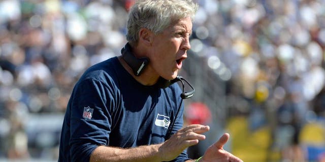 Sep 14, 2014; San Diego, CA, USA; Seattle Seahawks head coach Pete Carroll reacts to a third quarter touchdown against the San Diego Chargers at Qualcomm Stadium. Mandatory Credit: Robert Hanashiro-USA TODAY Sports