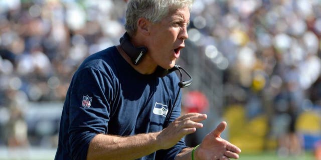 Sep 14, 2014; San Diego, CA, USA; Seattle Seahawks head coach Pete Carroll reacts to a third quarter touchdown against the San Diego Chargers at Qualcomm Stadium. Mandatory Credit: Robert Hanashiro-USA TODAY Sports