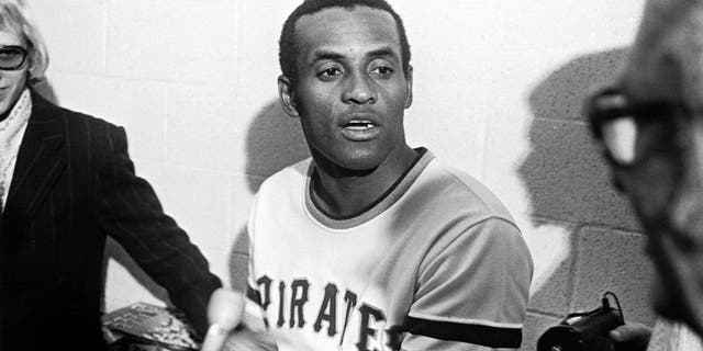 PITTSBURGH - Roberto Clemente #21 of the Pittsburgh Pirates talks to the media after getting his 3000th hit against the New York Mets at Three Rivers Stadium on September 30, 1972 in Pittsburgh, Pennsylvania. (Photo by: Morris Berman/MLB Photos via Getty Images)