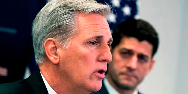 House Majority Leader Kevin McCarthy, R-Calif., joined at right by Speaker of the House Paul Ryan, R-Wis., talks with reporters at the Capitol in Washington, Feb. 6, 2018.