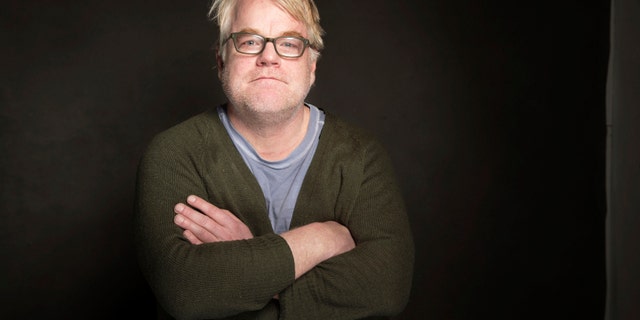 In a Jan. 19, 2014 photo Phillip Seymour Hoffman poses for a portrait at The Collective and Gibson Lounge Powered by CEG, during the Sundance Film Festival in Park City, Utah. Hoffman, who won the Oscar for best actor in 2006 for his portrayal of writer Truman Capote in "Capote" was found dead Sunday in his apartment in New York with what law enforcement officials said was a syringe in his arm. He was 46. (Photo by Victoria Will/Invision/AP)