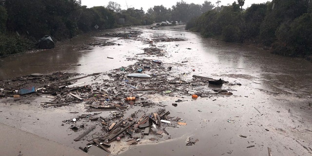 Debris floats in flooded waters on the freeway after a mudslide in Montecito, California, U.S. in this photo provided by the Santa Barbara County Fire Department, January 9, 2018.