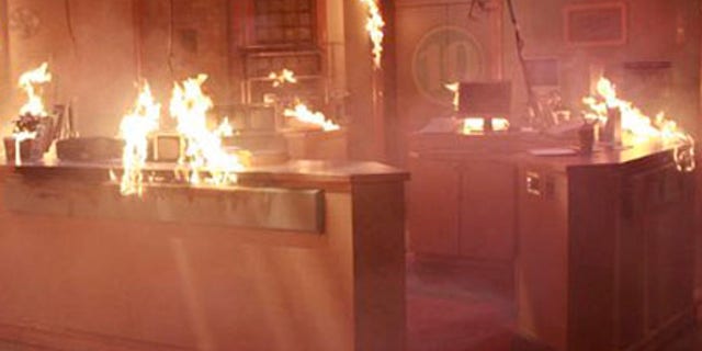 In this image released by ABC, the nurses hub set from the daytime series "General Hospital," is shown ablaze. After 45 years, the ABC daytime soap's long-standing hospital set is flatlining as part of an explosive storyline. Following a fiery crisis, the show's crew has ignited the clinical den of drama, and producers plan to construct a totally new interior. (AP Photo/ABC, Ron Tom) ** NO SALES **