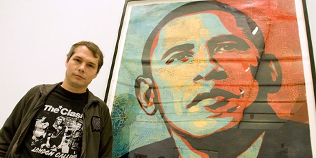 Feb. 3, 2009: Artist Shepard Fairey poses beside his "Obama HOPE" image, part of an exhibit of his work at the Institute of Contemporary Art.