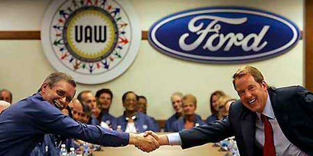 Ford Motor Co., Executive Chairman Bill Ford, right, will see the salary reductions this year and next.
