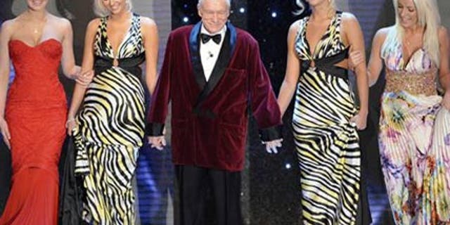 Feb. 20: Hugh Hefner arrives with his girlfriends at the "Festival di Sanremo" Italian song contest, in San Remo, Italy.
