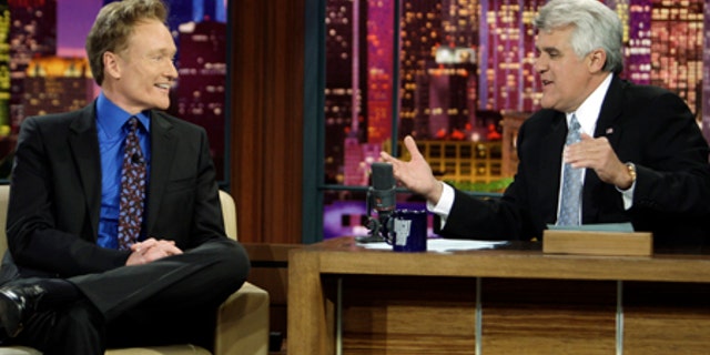 In this photo provided by NBC, Conan O'Brien interviewed by Jay Leno during Leno's final taping as host of The Tonight Show in Burbank, Calif. on Friday, May 29, 2009. (AP Photo/NBC, Paul Drinkwater) **MAGS OUT, NO ARCHIVING, NO SALES**