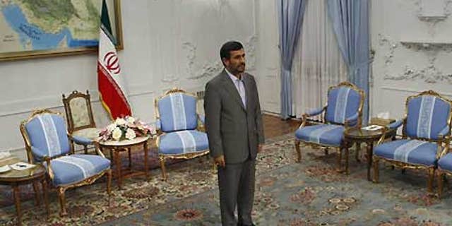 Sept. 7: Iranian President Mahmoud Ahmadinejad waits to meet the Iraqi parliament speaker, Ayad al-Samarraie.
