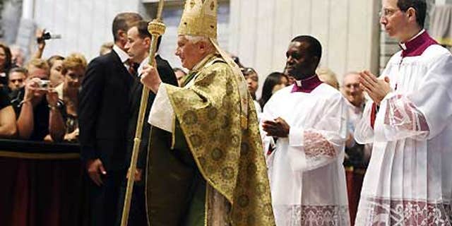 Oct. 4: Pope Benedict XVI arrives in St. Peter's Basilica at the Vatican to celebrate a mass for the opening of the synod on Africa.