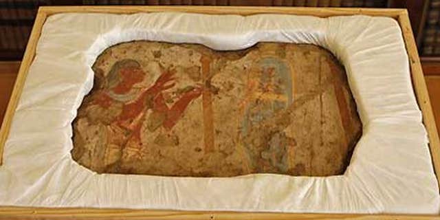 Dec. 14: One of the five fragments of an ancient wall painting that France returned to Egypt on Monday