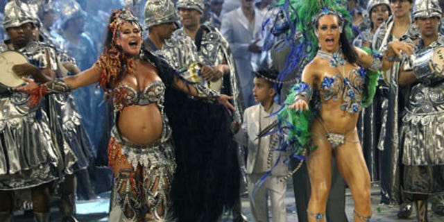Feb. 13: Dancers perform during the parade of Unidos de Vila Maria samba school at the Sambadrome.