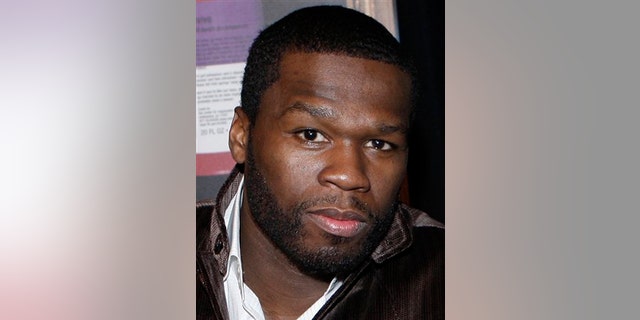 ** FILE ** In this Jan. 17, 2009 file photo, Curtis "50 Cent" Jackson poses before hosting a screening of the documentary film "Two Turntables and a Microphone" during the Sundance Film Festival in Park City, Utah. (AP Photo/Matt Sayles, file)