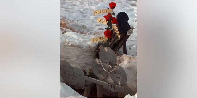 Feb. 6, 1999: A memorial is set up where Buddy Holly, Ritchie Valens, and J.P. The Big Bopper Richardson, died in a plane crash in Clear Lake, Iowa.