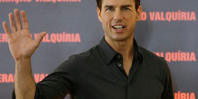 Feb. 3: Actor Tom Cruise waves during a photo call to promote his movie "Valkyrie" in Rio de Janeiro, Tuesday.