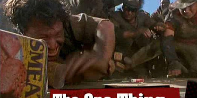 Is our government trying to buy us off like the people in this 'Waterworld' scene?