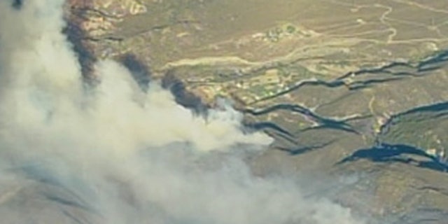 Forest fire burns in Southern California.