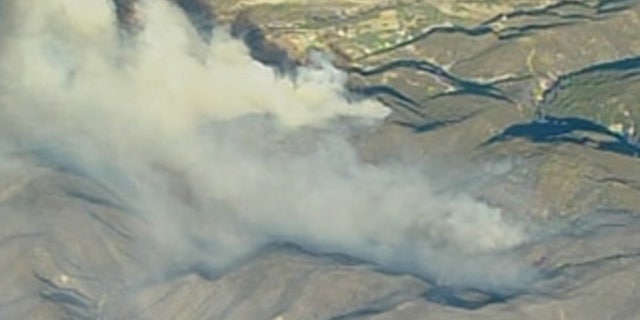 Forest fire burns in Southern California.