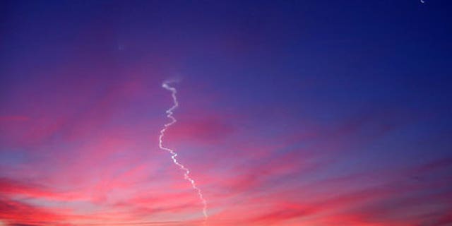 A Dec. 2006 Minotaur rocket launch from Wallops Island, Va., as photographed by Geoff Chester in Alexandria, Va.