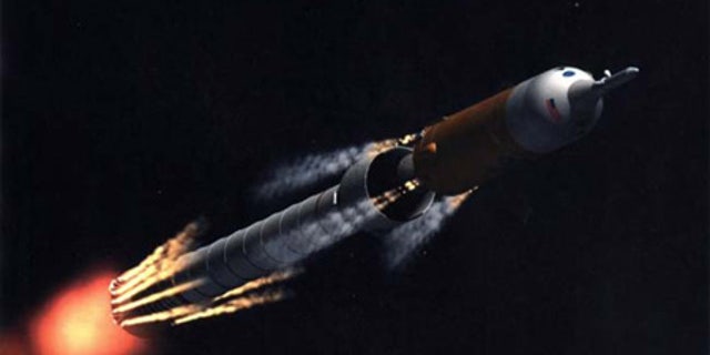 Artist concept of NASA's planned Ares I stage separation that would occur when the first stage runs out of propellant.