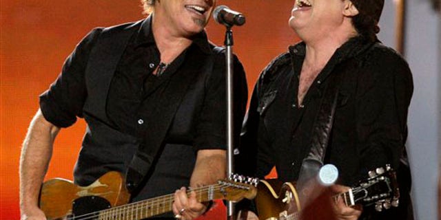 ** FILE ** In this Feb. 1, 2009 file photo, Bruce Springsteen, left, and Steven Van Zandt, of Bruce Springsteen and the E Street Band, perform at halftime at the NFL Super Bowl XLIII football game between the Arizona Cardinals and Pittsburgh Steelers in Tampa, Fla. (AP Photo/Winslow Townson, file)