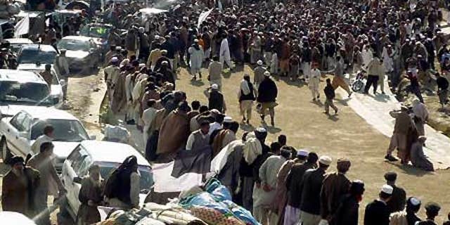 Feb. 17: A crowd gathers in Mingora, a city in the troubled Swat valley, Pakistan.