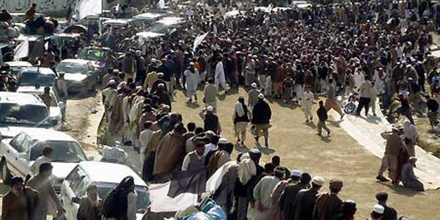 Feb. 17: A crowd gathers in Mingora, a city in the troubled Swat valley, Pakistan.