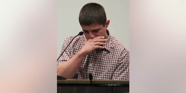 Feb. 12: Brandon Simkins cries at the Butler County Courthouse in Allison, Iowa as he recalls Mark Becker pulling a gun on him.