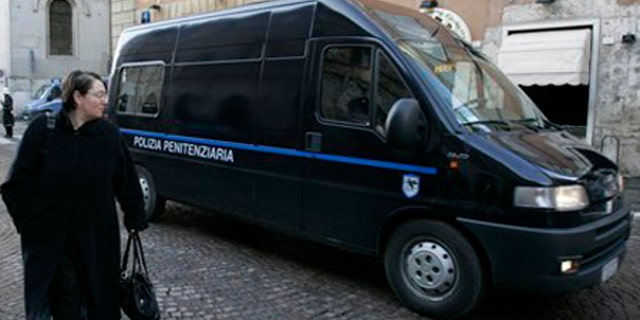 Feb. 6: Two Italian Penitentiary police vans, believed to have on board Amanda Knox and Raffaele Sollecito, arrive at the court building in Perugia.
