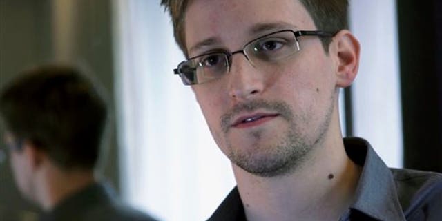 June 9, 2013 - FILE photo of Edward Snowden. The former NSA contract employee-- who handed over thousands of documents revealing a massive US government surveillance program -- will likely have his asylum extended by Russia next week.