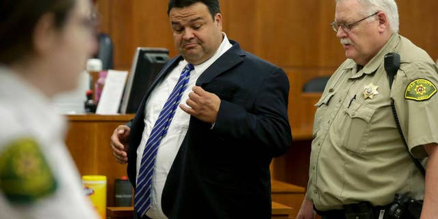 In this Thursday, March 30, 2017, photo, Keith Vallejo leaves the courtroom, in Provo, Utah.