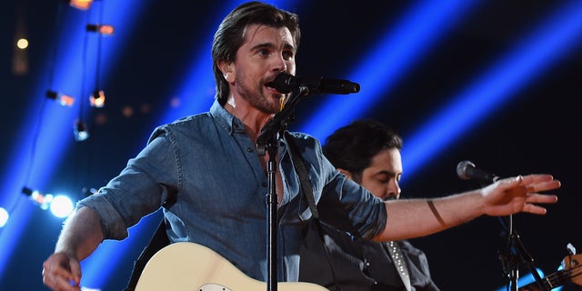 LOS ANGELES, CA - FEBRUARY 08:  Recording Artist Juanes performs onstage during The 57th Annual GRAMMY Awards at the STAPLES Center on February 8, 2015 in Los Angeles, California.  (Photo by Larry Busacca/Getty Images for NARAS)