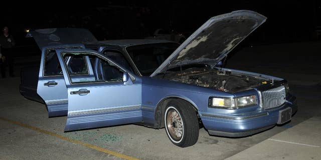 This undated photo provided by the Lafayette Police Department shows the car John Russel Houser was driving before he opened fire in a movie theater July 23, 2015, in Lafayette, La. Lafayette police said in an email Tuesday, July 28, that they are releasing the photographs in hopes that people may have seen the blue 1995 Lincoln Continental and may remember encountering Houser. (Lafayette Police Department via AP)