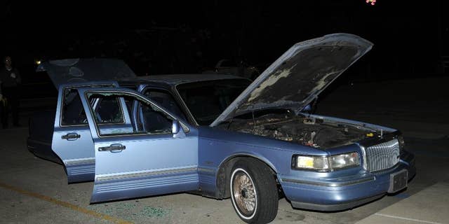 This undated photo provided by the Lafayette Police Department shows the car John Russel Houser was driving before he opened fire in a movie theater July 23, 2015, in Lafayette, La. Lafayette police said in an email Tuesday, July 28, that they are releasing the photographs in hopes that people may have seen the blue 1995 Lincoln Continental and may remember encountering Houser. (Lafayette Police Department via AP)