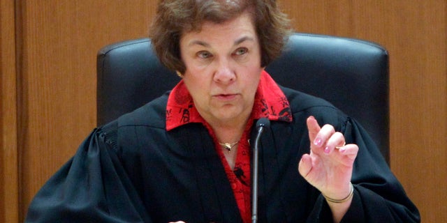 Friday: Judge Maryann Sumi listens to arguments during a hearing in Dane County Curcuit Court in Madison, Wis.