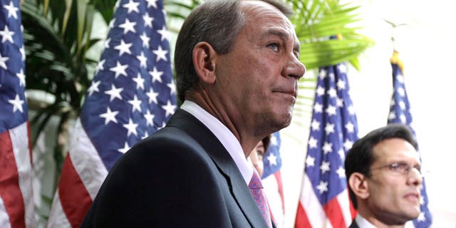 Jan. 25: House Speaker John Boehner of Ohio accompanied by House Majority Leader Eric Cantor of Virginia, listen to a question from reporters on Capitol Hill in Washington, D.C. House Republicans have offered $4 billion in cuts in an effort to prevent a government shutdown.