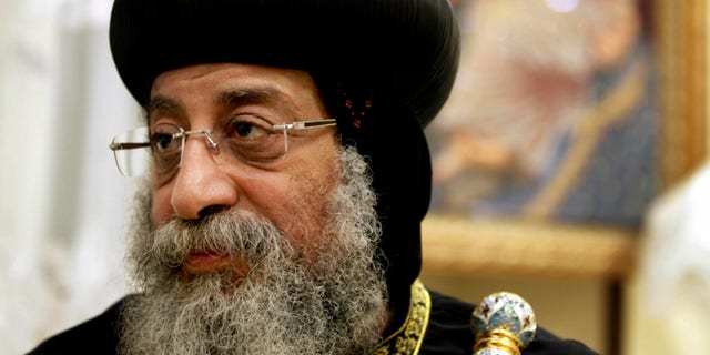 Feb. 5, 2013: In this file photo, Egypt's Coptic Christian Pope, Tawadros II speaks to The Associated Press in the province of Assiut, Egypt. Christians angered by the killing of four Christians in weekend sectarian violence clashed Sunday after a funeral with a mob throwing rocks and firebombs, killing at least one person and turning Cairo's main Coptic cathedral into a battleground. Tawadros who was not in the cathedral, his headquarters, during the funeral and the violence that followed, called for calm as the specter of sectarian violence threatened to spread to the rest of the country.