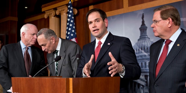 Sen. Marco Rubio, R-Fla., center, and Sen. Robert Menendez, D-N.J., far right.