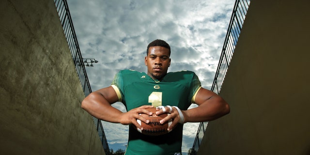 In this photo taken Aug. 6, 2012, Grayson defensive lineman Robert Nkemdiche poses for a portrait in Loganville, Ga. Nkemdiche is the consensus No. 1 high school recruit in the nation and is being compared to such former greats as Reggie White and current stars as Jadeveon Clowney. (AP Photo/Atlanta-Journal, Constitution, Jason Getz) MARIETTA DAILY OUT; GWINNETT DAILY POST OUT; LOCAL TV OUT; WXIA-TV OUT; WGCL-TV OUT