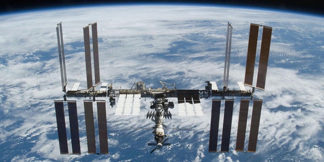 The International Space Station is photographed soon after the space shuttle Atlantis and the station began their post-undocking separation in 2009.