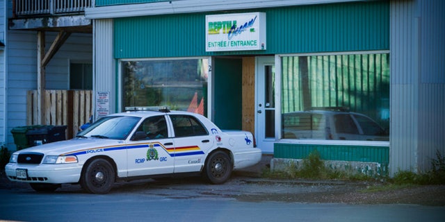 Aug. 6, 2013: A Royal Canadian Mounted Police cruiser sits outside the Reptile Ocean exotic pet store in Campbellton, New Brunswick, Canada.